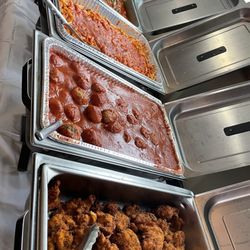 Top to bottom : veal with peppers; pasta with sauce; meatballs; fried breaded chicken