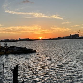 Fishlips - Sunset viewed from the patio - Bars Near Me - Cape Canaveral, Florida Fishlips - Sunset viewed from the patio - Bars Near Me - Cape Canaveral, Florida