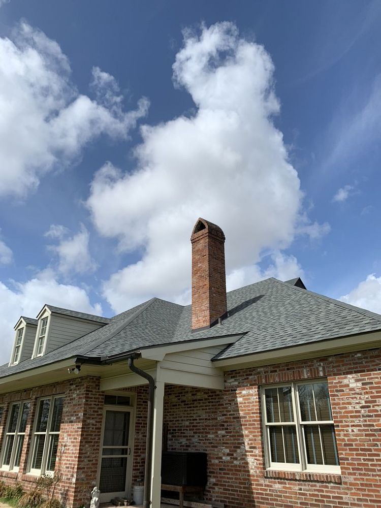 Slide of Pelican Roofing Company