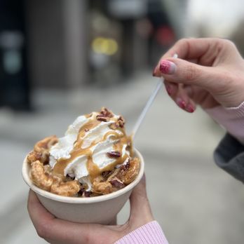 Earnest Ice Cream - a hand holding a cup of ice cream - Ice Cream & Frozen Yogurt Near Me - North Vancouver, British Columbia