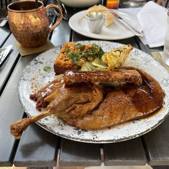 Backstreet Cafe - Crispy Duck with Crispy Scalloped Potatoes and Grilled Cabbage... my oh my this was so tasty and the portion size was huge!! - New American Near Me - Houston, Texas Backstreet Cafe - Crispy Duck with Crispy Scalloped Potatoes and Grilled Cabbage... my oh my this was so tasty and the portion size was huge!! - New American Near Me - Houston, Texas