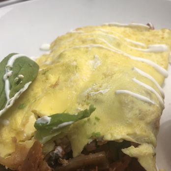 Broken Yolk Cafe - No Name Omelet. If you're  looking for the sour cream, it's that thin squiggle! - Breakfast & Brunch Near Me - Costa Mesa, California