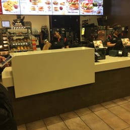 customers ordering food at the counter