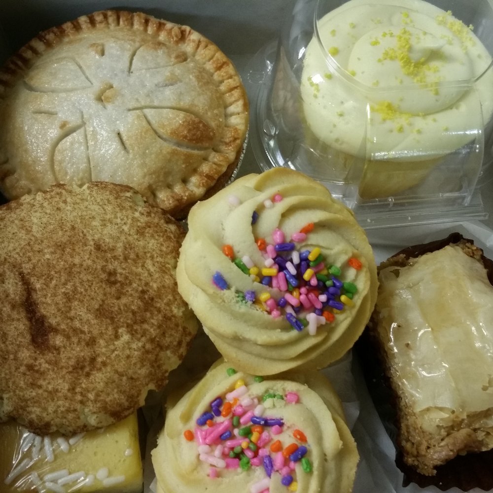 Apple pie, lemon sour cream muffin, baklava, spritz cookies, lemon bar and snickerdoodle.