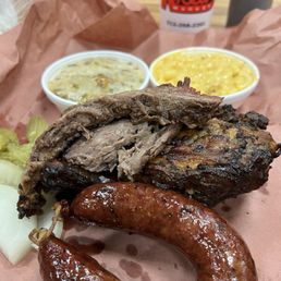 Brisket, 1/2 chicken, sausage, side of baked tater casserole and mac. Brisket, 1/2 chicken, sausage, side of baked tater casserole and mac.