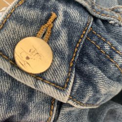 Replaced lost button with a very scratched up one