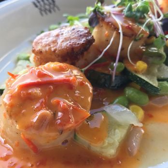 The Bay House - Seared Sea Scallops: Vegetable succotash, pepper jelly vinaigrette. - Seafood Near Me - Naples, Florida The Bay House - Seared Sea Scallops: Vegetable succotash, pepper jelly vinaigrette. - Seafood Near Me - Naples, Florida