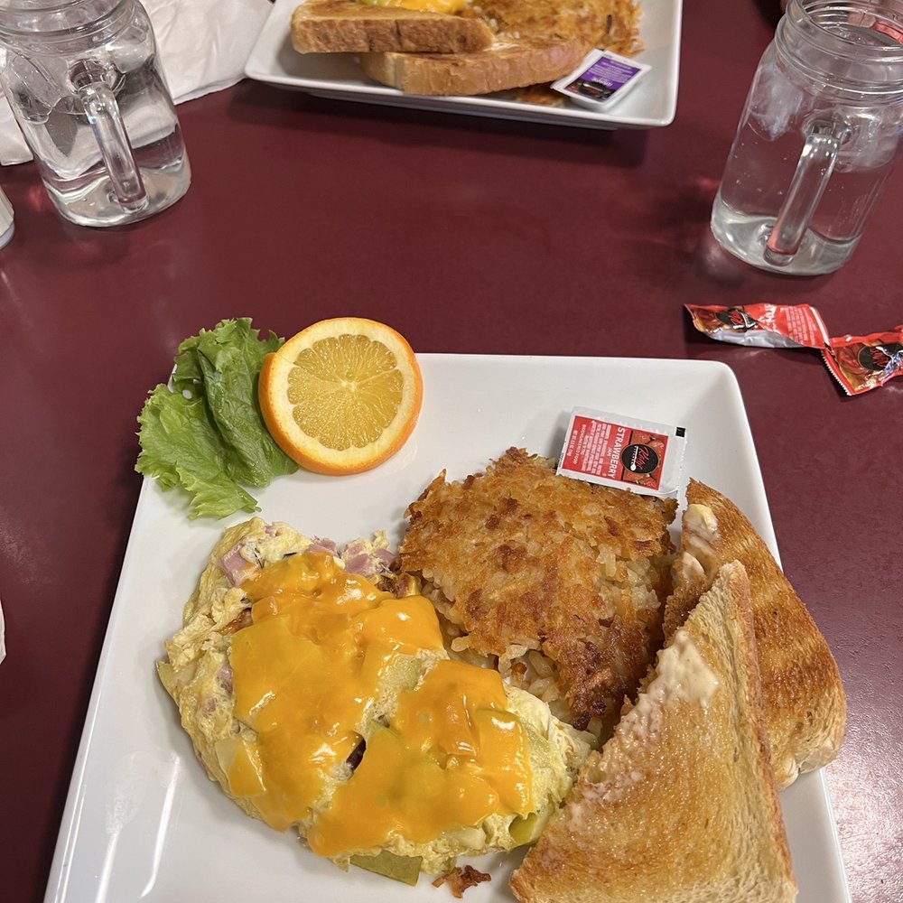 Woody Mountain Omelette -Diced Ham -Smoked Apples -Cheddar Cheese Woody Mountain Omelette -Diced Ham -Smoked Apples -Cheddar Cheese