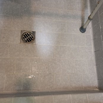 FW House Cleaning - Water drops were left on shower floor. - Home Cleaning Near Me
