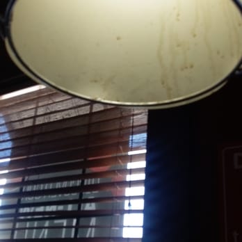 Pizza Hut - This was just tthe light gross hanging over your booth come on people seriously - Pizza Near Me - Pleasanton, Texas Pizza Hut - This was just tthe light gross hanging over your booth come on people seriously - Pizza Near Me - Pleasanton, Texas