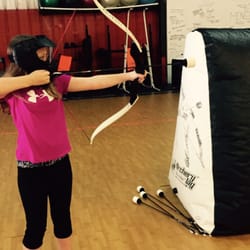 Hot Shots Archery Games - Archery tag great for kids.   Natalie is aiming for her brother, Brendon.