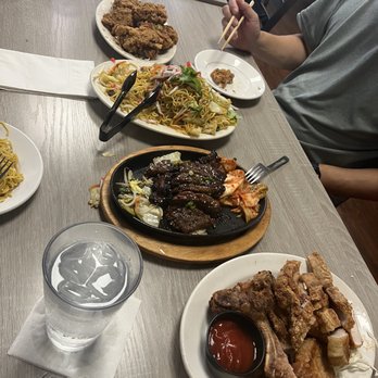Side Street Inn - Garlic chicken- top Yakisoba Sizzling boneless kalbi Pork chop (bottom) - Sports Bars Near Me - Honolulu, Hawaii Side Street Inn - Garlic chicken- top Yakisoba Sizzling boneless kalbi Pork chop (bottom) - Sports Bars Near Me - Honolulu, Hawaii