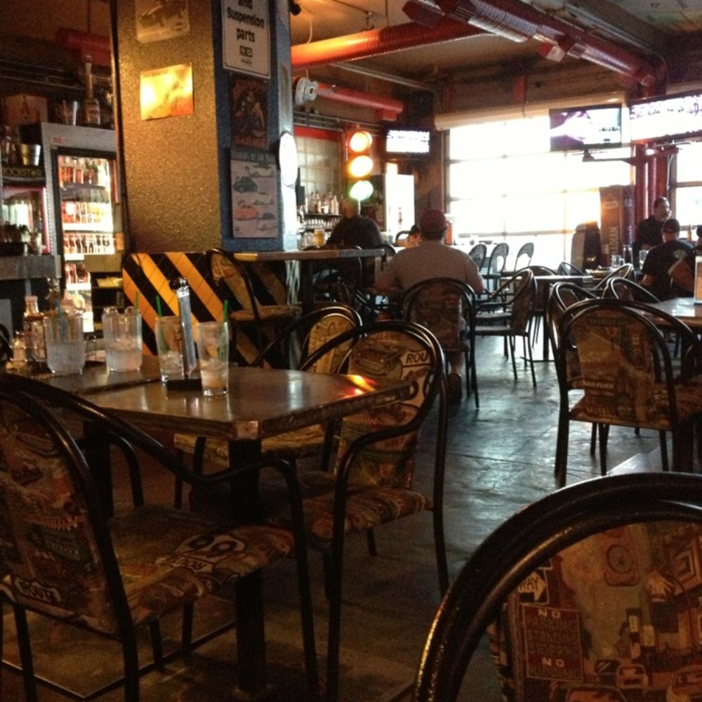 The Garage Pub & Eatery - tables and chairs - Burgers Near Me - Medicine Hat, Alberta The Garage Pub & Eatery - tables and chairs - Burgers Near Me - Medicine Hat, Alberta