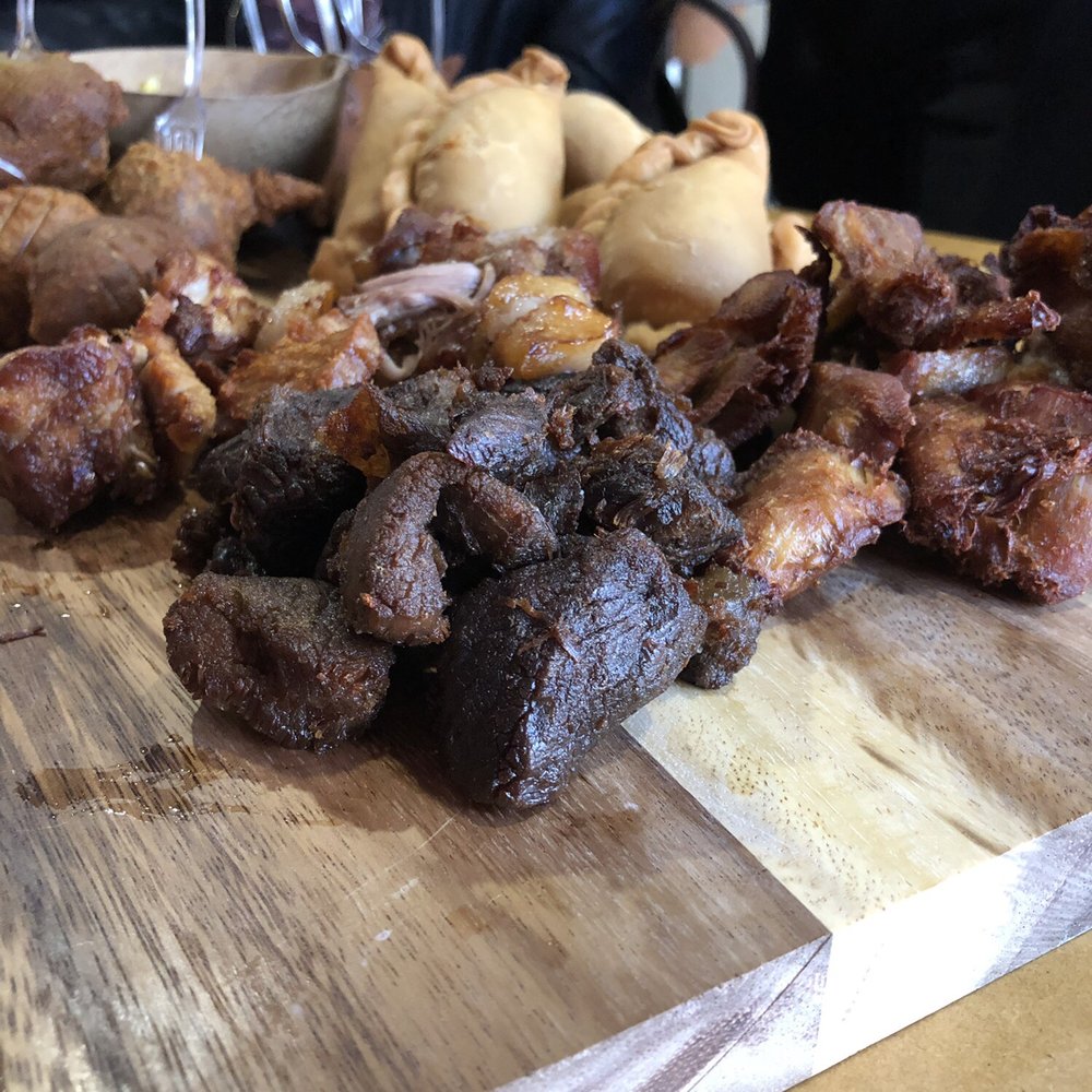 Shandmas - Appetizer platter with lamb, Griot, chicken, patties and akra balls - Haitian Near Me - Montreal, Quebec Shandmas - Appetizer platter with lamb, Griot, chicken, patties and akra balls - Haitian Near Me - Montreal, Quebec