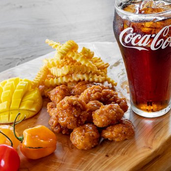 The Wing Experience - a glass of coke and a plate of food - Chicken Wings Near Me - Bowie, Maryland The Wing Experience - a glass of coke and a plate of food - Chicken Wings Near Me - Bowie, Maryland