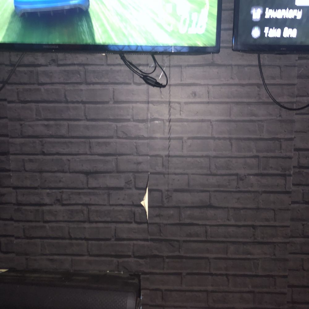 Games On Wheels - Damages, ripped wall paper - Game Truck Rental Near Me - Houston, Texas
