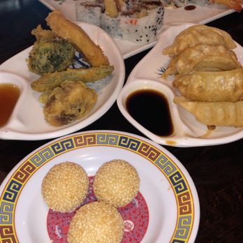 Royal Sushi - Sesame balls, gyoza, vegetable tempura, shrimp tempura and torched dragon roll. - Japanese Near Me - Chicago, Illinois Royal Sushi - Sesame balls, gyoza, vegetable tempura, shrimp tempura and torched dragon roll. - Japanese Near Me - Chicago, Illinois