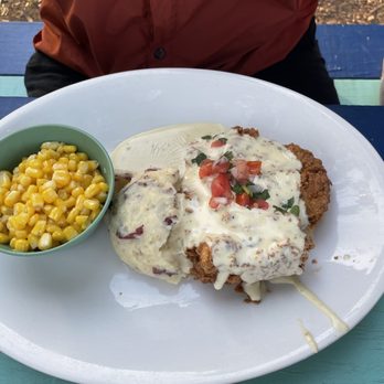 Ivar's River Pub - Chicken Pico con Queso with corn and Roasted Garlic Mashed Potatos - American Near Me - San Marcos, Texas Ivar's River Pub - Chicken Pico con Queso with corn and Roasted Garlic Mashed Potatos - American Near Me - San Marcos, Texas