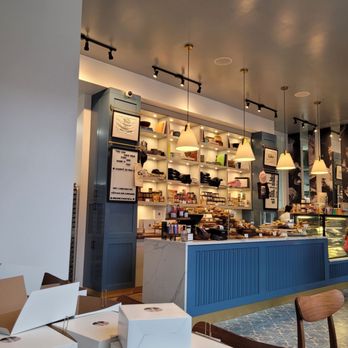 Bernice - the interior of a bakery with boxes of food on the counter - Coffee & Tea Near Me - Montreal, Quebec