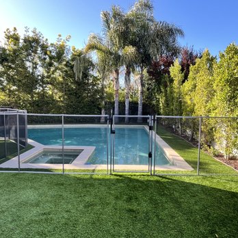 Marco’s Removable Pool Fence & Safety Nets - 4' tall fence gray/black installed on turf - Fences & Gates Near Me Marco’s Removable Pool Fence & Safety Nets - 4' tall fence gray/black installed on turf - Fences & Gates Near Me