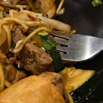 Wok n Roll Kitchen - The Combination Pan Fried Noodles with chicken, beef, and shrimp. With an egg roll. - Asian Fusion Near Me - Roanoke, Virginia