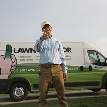 Lawn Doctor - a man talking on his cell phone - Tree Services Near Me - Little Rock, Arkansas Lawn Doctor - a man talking on his cell phone - Tree Services Near Me - Little Rock, Arkansas