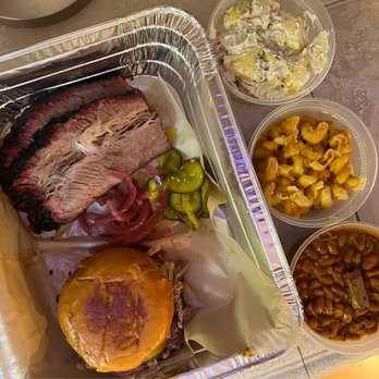 Ruff House BBQ - Brisket, pulled pork sandwich, potato salad, Mac n cheese, and brisket in baked beans - Barbeque Near Me - Ventura, California