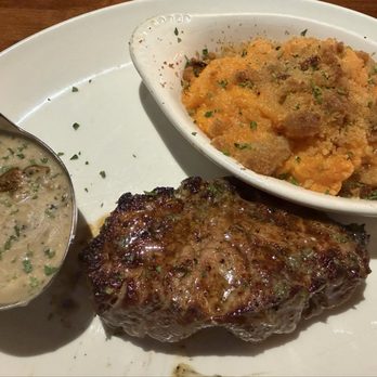 Stoney River - 7 oz filet with Au Poivre sauce and sweet potato casserole - everything was awesome - Steakhouses Near Me - Germantown, Tennessee Stoney River - 7 oz filet with Au Poivre sauce and sweet potato casserole - everything was awesome - Steakhouses Near Me - Germantown, Tennessee
