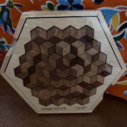 Puzzled - This is the Hexagon puzzle, an excellent source to help build problem solving skills.