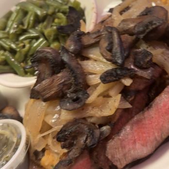 Texas Roadhouse - Sliced Steak with chimichuri sauce and green beans on the side. The steak is ontop of a seasoned rice - Barbeque Near Me - Jacksonville, Florida Texas Roadhouse - Sliced Steak with chimichuri sauce and green beans on the side. The steak is ontop of a seasoned rice - Barbeque Near Me - Jacksonville, Florida