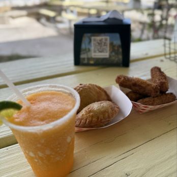 Open Seas Paella Española - Frozen mango margarita , Argentinian empanadas and ham croquetas - Spanish Near Me - Key Biscayne, Florida Open Seas Paella Española - Frozen mango margarita , Argentinian empanadas and ham croquetas - Spanish Near Me - Key Biscayne, Florida