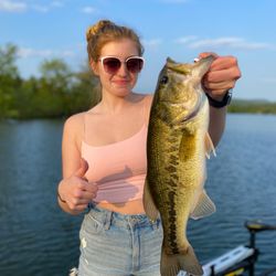 Hooked Up Guiding Service - Rachel's first ever bass! What a fight!