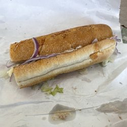 A tuna sub with hardly any tuna inside