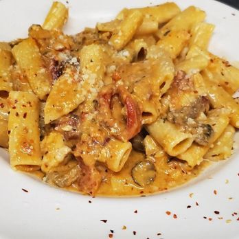 Gone Coastal - a plate of pasta with meat and cheese - Seafood Near Me - Lee Center, New York