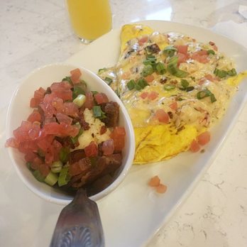 Another Broken Egg Cafe - Lobster and brie omelet - Breakfast & Brunch Near Me - Oviedo, Florida Another Broken Egg Cafe - Lobster and brie omelet - Breakfast & Brunch Near Me - Oviedo, Florida