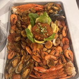 Snow crab leg, mussels, clams, shrimp, sausage, corn, Jambalaya Snow crab leg, mussels, clams, shrimp, sausage, corn, Jambalaya