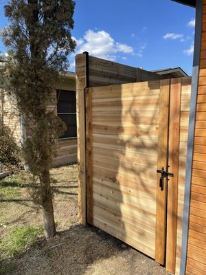 New Horizontal Fence - This is a new horizontal fence that is 8ft tall.