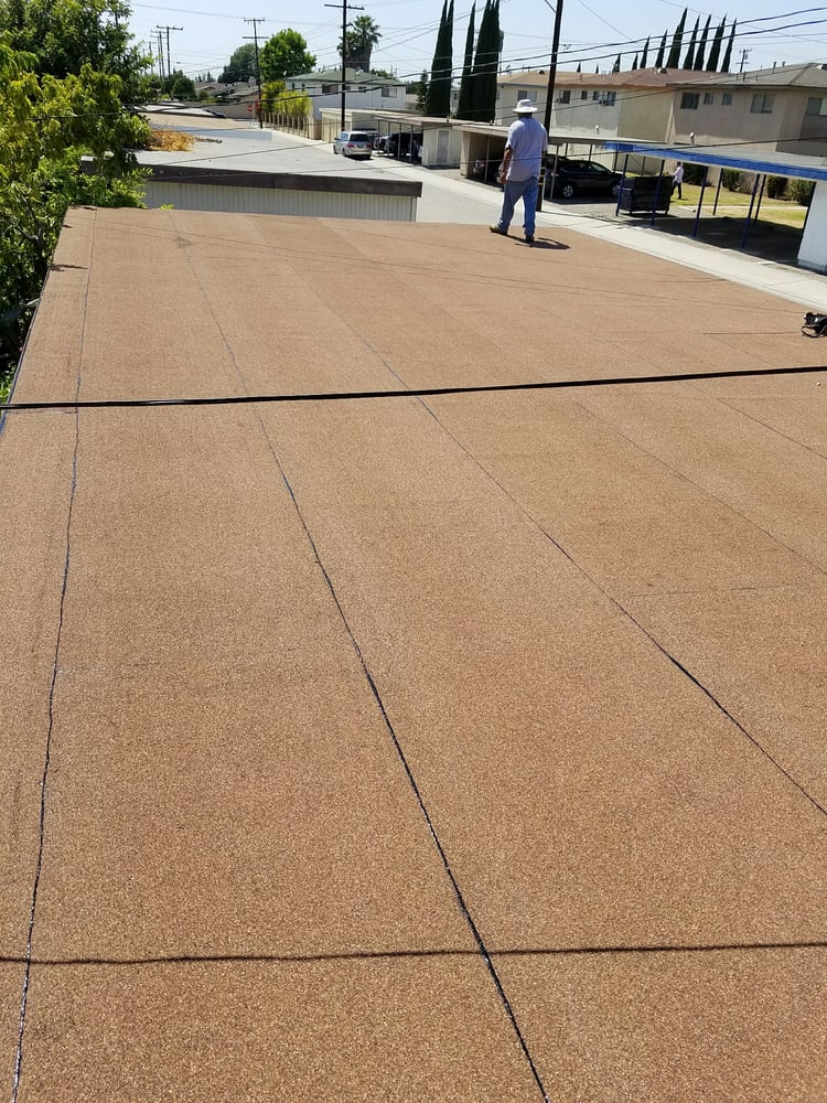 Slide of Mario's Roofing Services