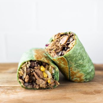 Surcheros Fresh Mex - Carnitas Burrito wrapped in our spinach tortilla - Tex-Mex Near Me - Kingsland, Georgia Surcheros Fresh Mex - Carnitas Burrito wrapped in our spinach tortilla - Tex-Mex Near Me - Kingsland, Georgia