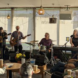 Chit-Chat Cafe - Fan playing music live