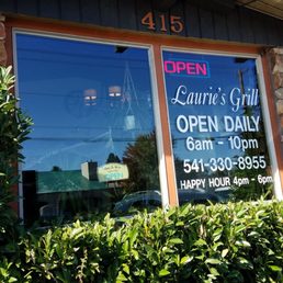 Exterior outside entrance of Laurie's Grill - Fall 2021 hours are 6a to 3p...staff shortages...not 10p as sign on window - Bend, Oregon Exterior outside entrance of Laurie's Grill - Fall 2021 hours are 6a to 3p...staff shortages...not 10p as sign on window - Bend, Oregon
