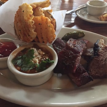 Lamberts Downtown Barbecue - Brisket and pork ribs with crisscut fries and beans - Barbeque Near Me - Austin, Texas Lamberts Downtown Barbecue - Brisket and pork ribs with crisscut fries and beans - Barbeque Near Me - Austin, Texas
