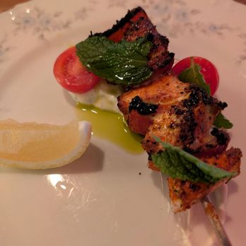 Mabel Gray - Swordfish Skewer with Tatziki, olive oil, split cherry tomato, and mint. - New American Near Me - Hazel Park, Michigan