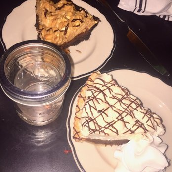 Rosebud Bar & Kitchen - Chocolate pie (front) and peanut butter pie (back) - New American Near Me - Somerville, Massachusetts Rosebud Bar & Kitchen - Chocolate pie (front) and peanut butter pie (back) - New American Near Me - Somerville, Massachusetts