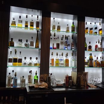 Raw Sushi Bistro - Bar selection of spirits. The tall don Julio sure sticks out. - Japanese Near Me - Stockton, California Raw Sushi Bistro - Bar selection of spirits. The tall don Julio sure sticks out. - Japanese Near Me - Stockton, California
