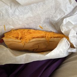 Hot dog with cheese, tomatoes and mayo. Hot dog with cheese, tomatoes and mayo.