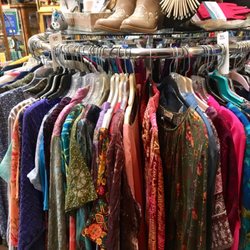 Yachats Mystic Antiques - Shown: Full rack of women's size L, XL and 1X to 4X tops.