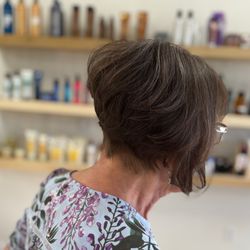 Salon Santinas - Fresh and fabulous! Lina worked her magic with this chic stacked bob, perfect for adding volume and texture.
