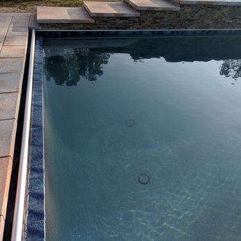A Safe Pool Enclosures - That's the cover when it's fully open - Childproofing Near Me