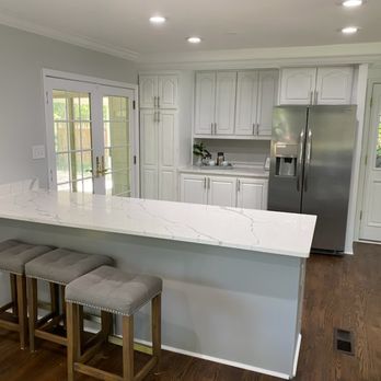 Abarcas Home Solutions - a kitchen with a large island - General Contractors Near Me Abarcas Home Solutions - a kitchen with a large island - General Contractors Near Me